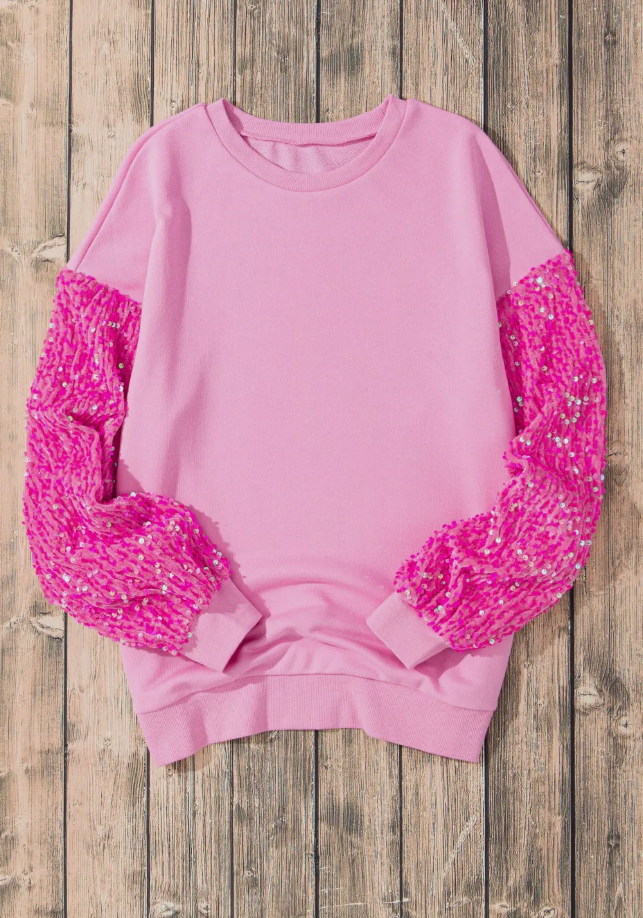 Pink top with pink sequin sleeves