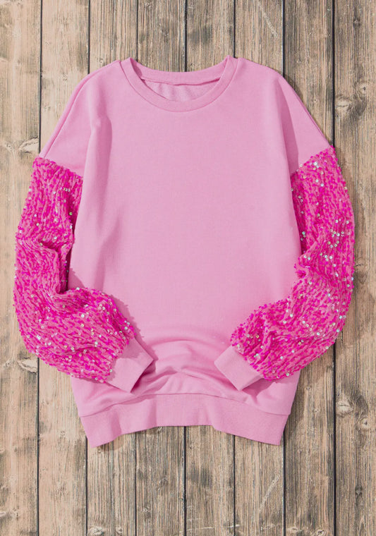 Pink top with pink sequin sleeves