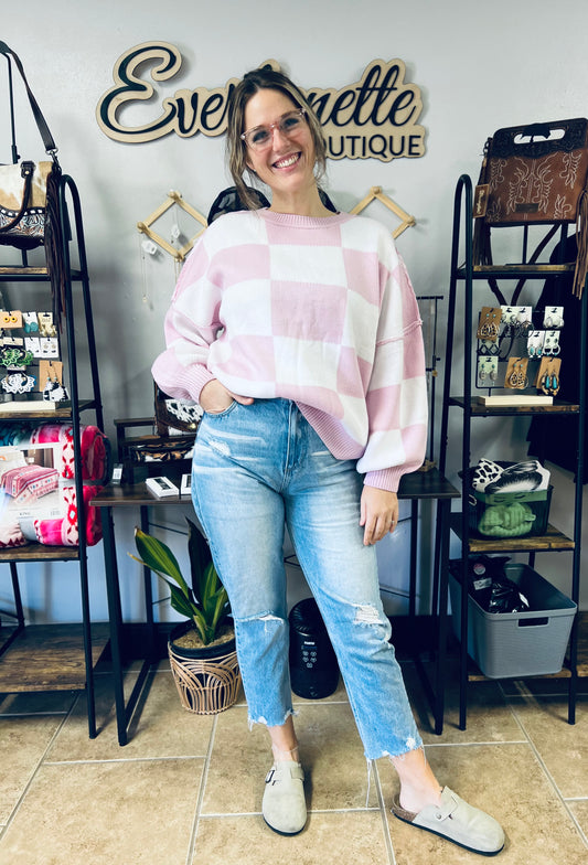 White and pink checkered sweatshirt